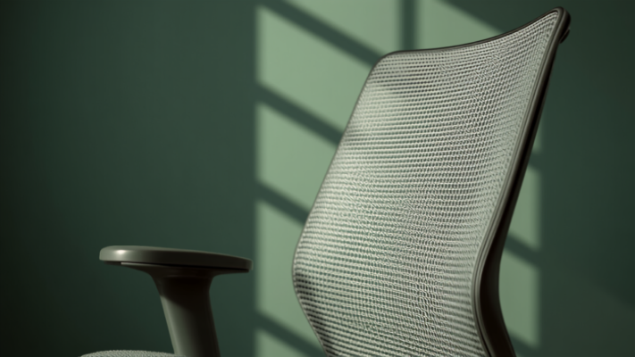 Close-up of ergonomic mesh office chair armrest